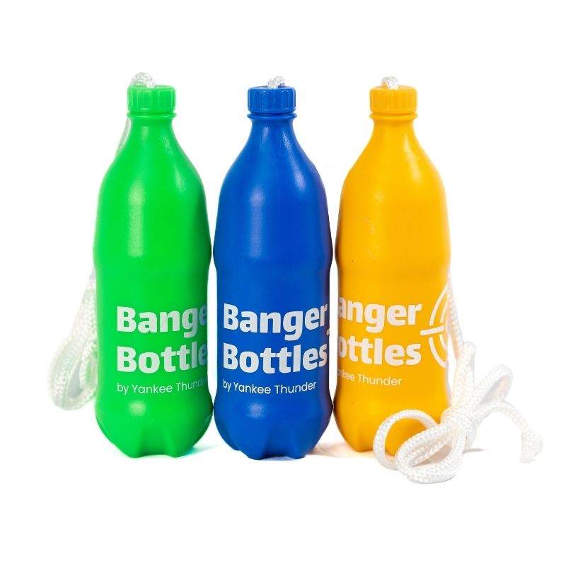 Three shatterproof Banger Bottles Targets ⭐️⭐️⭐️⭐️⭐️ by Yankee Thunder with white rope handles are displayed side by side. They come in neon green, blue, and yellow colors, each proudly displaying the text 