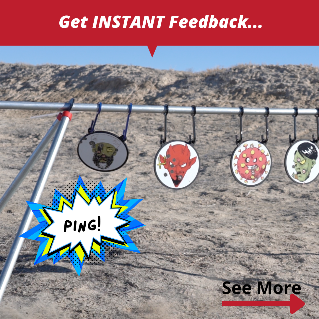 A shooting target setup in a desert features a steel frame holding round AR500 steel targets designed by Yankee Thunder, each adorned with cartoon faces of zombies, a red demon, and a virus. One target is hit with a “PING!” comic effect. A red banner reads 