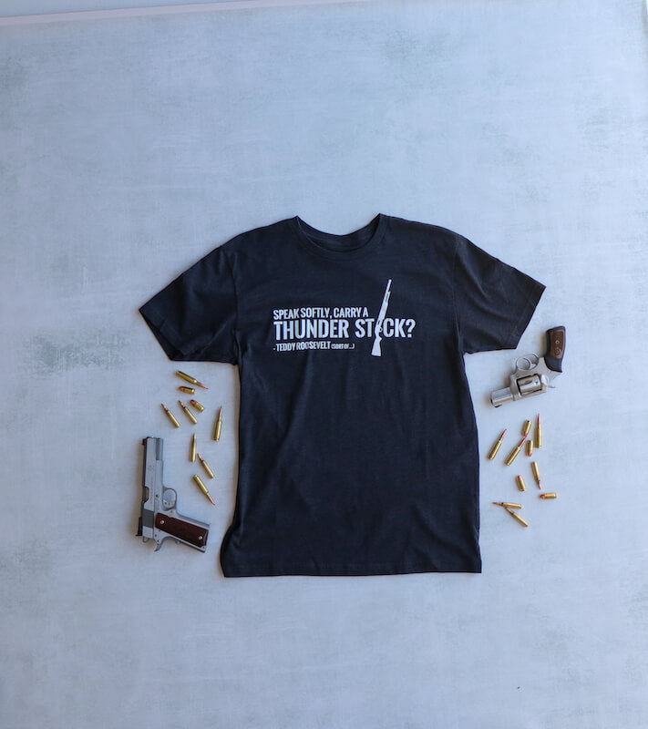 Speak Softly Carry a Thunder Stick Tee